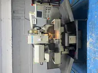 Magazinli CNC Freze Dik İşleme Merkezi