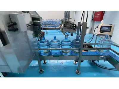 Машина для наполнения 15-литровых стеклянных бутылок с возможностью возврата