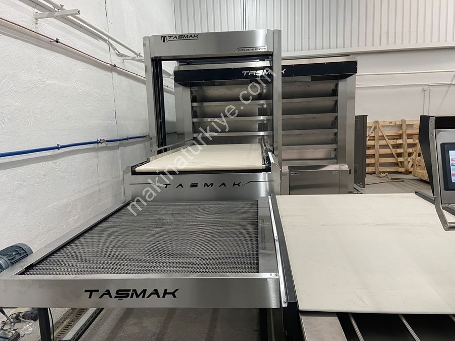 Four tubulaire en pierre avec robot pour 1170 pièces/heure
