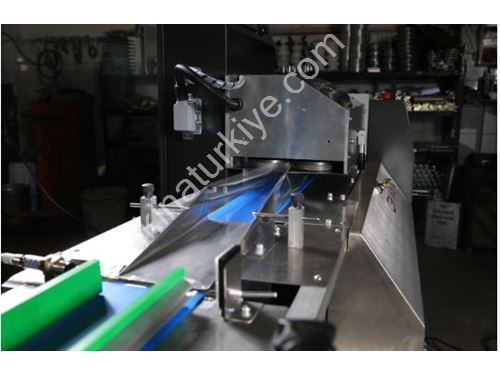 Reverse Conveyor Packaging Machine