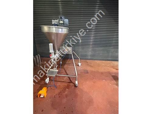 SEMI-AUTOMATIC LIQUID FILLING MACHINE