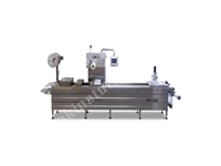 Machine d'emballage et de thermoformage
