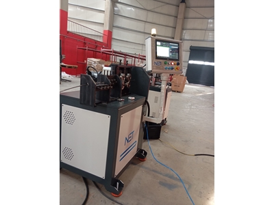 Machine de production de barres à espagnolettes - 1