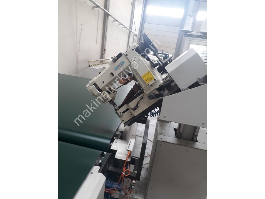 Machine de fermeture automatique des bords de lit Gemba modèle 2020