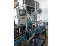2 Nozzle Fully Automatic Servo Labeling, Filling and Capping Machine