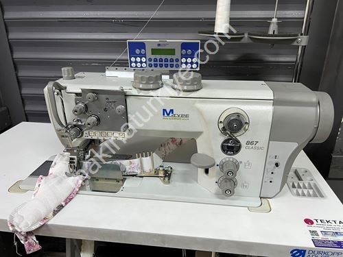 Machine à coudre pour bordures de couette