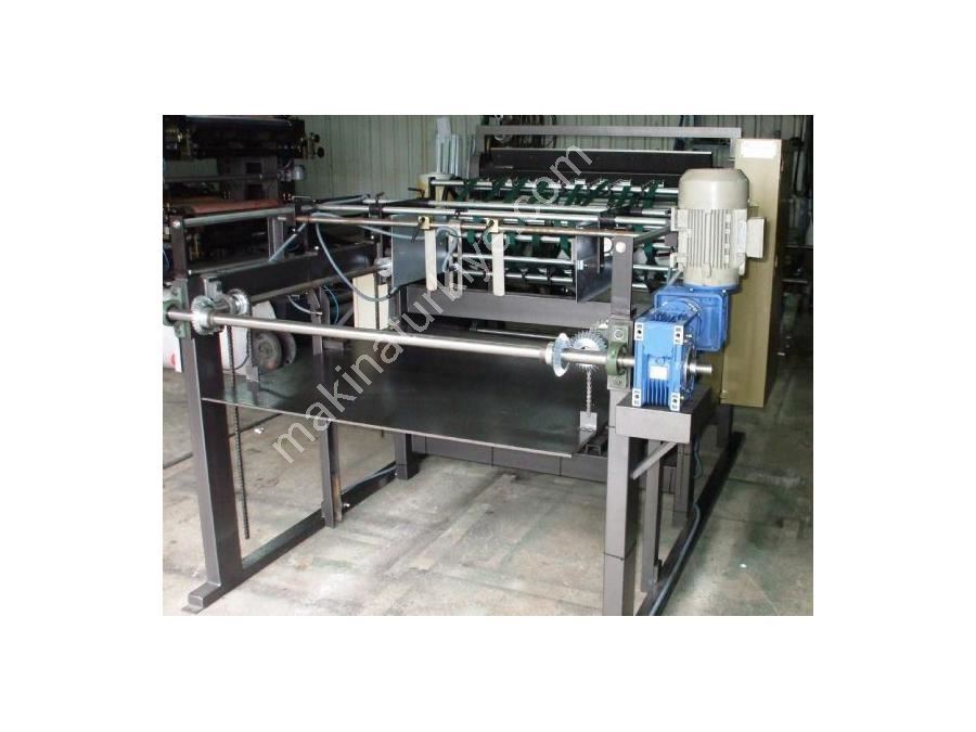 Машина для обрезки и резки с двумя бобинами