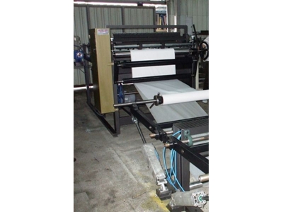 Машина для обрезки и резки с двумя бобинами - 1