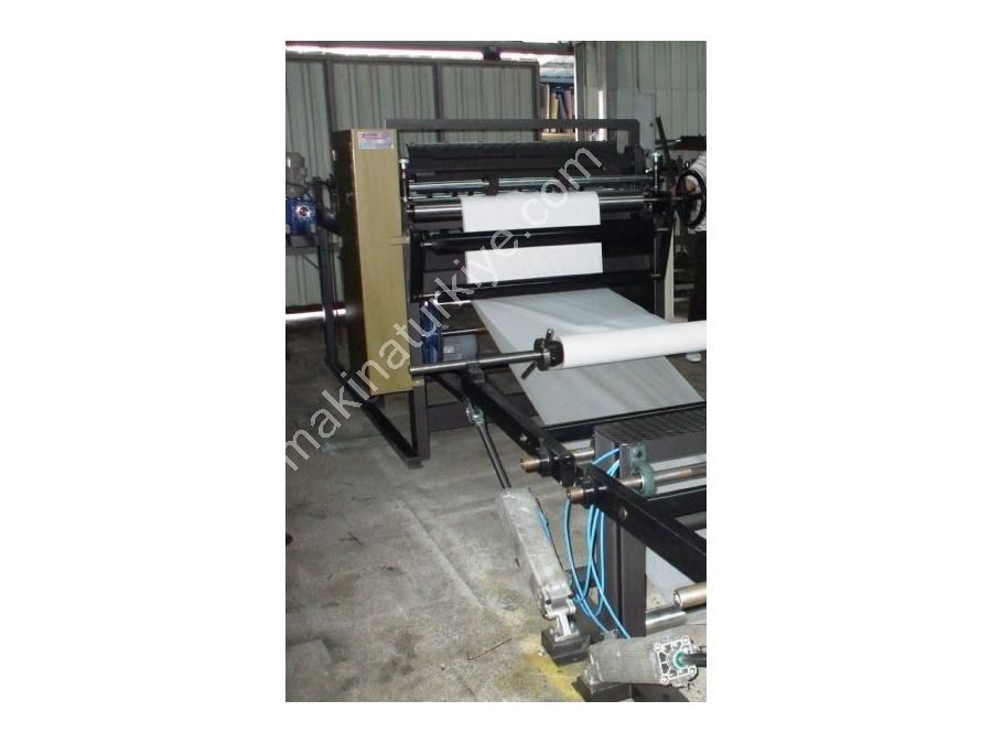 Машина для обрезки и резки с двумя бобинами