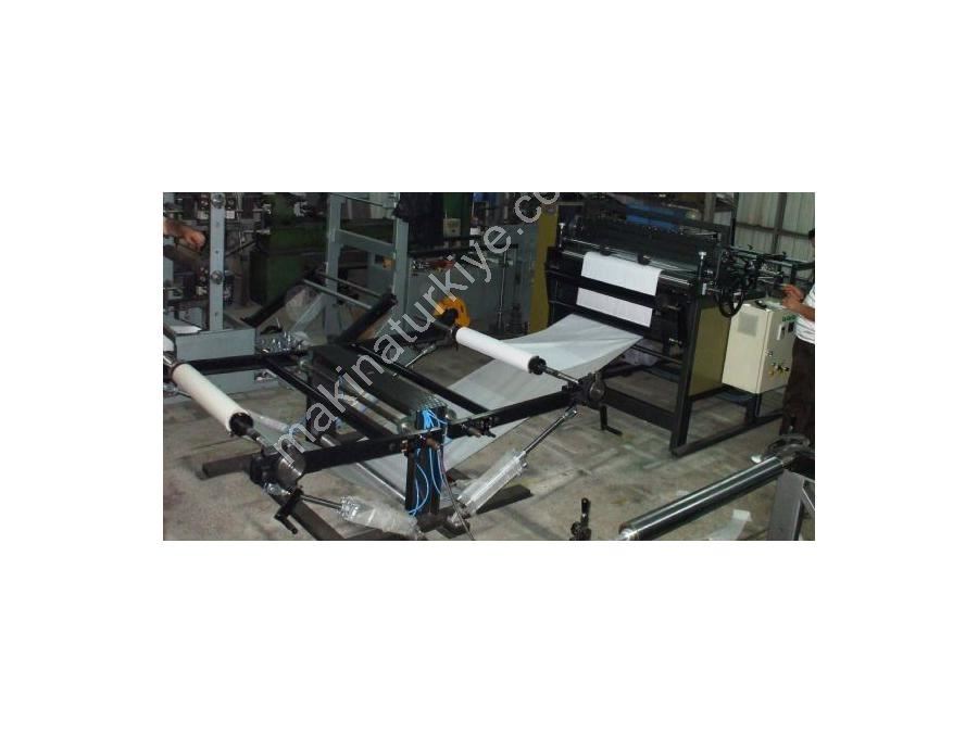 Машина для обрезки и резки с двумя бобинами