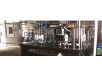 FULL OTOMATİK VOLUMETRİK SIVI DOLUM VE KAPATMA MAKİNASI