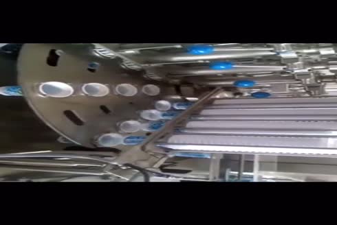 5000-5500 Piece/Hour (4 Nozzles) Rotary Filling And Foil Sealing Machine